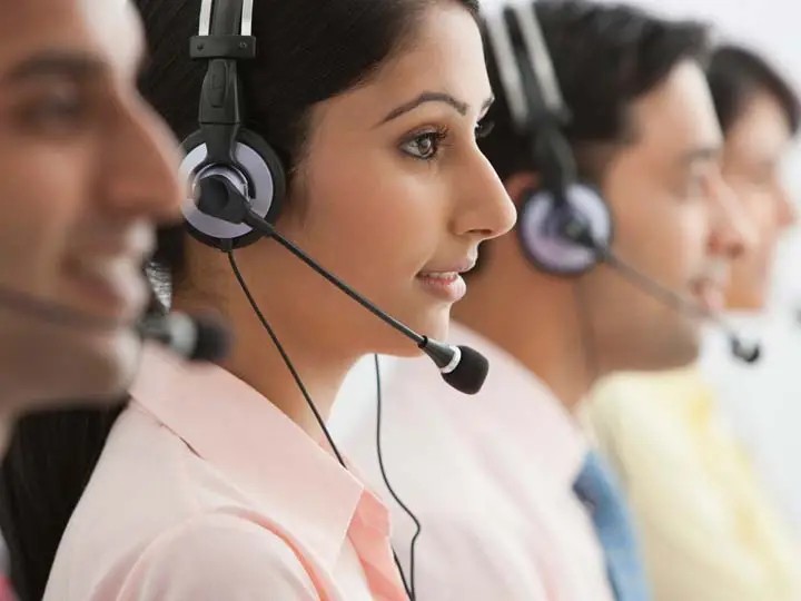 Roadside assistance support representative wearing a headset